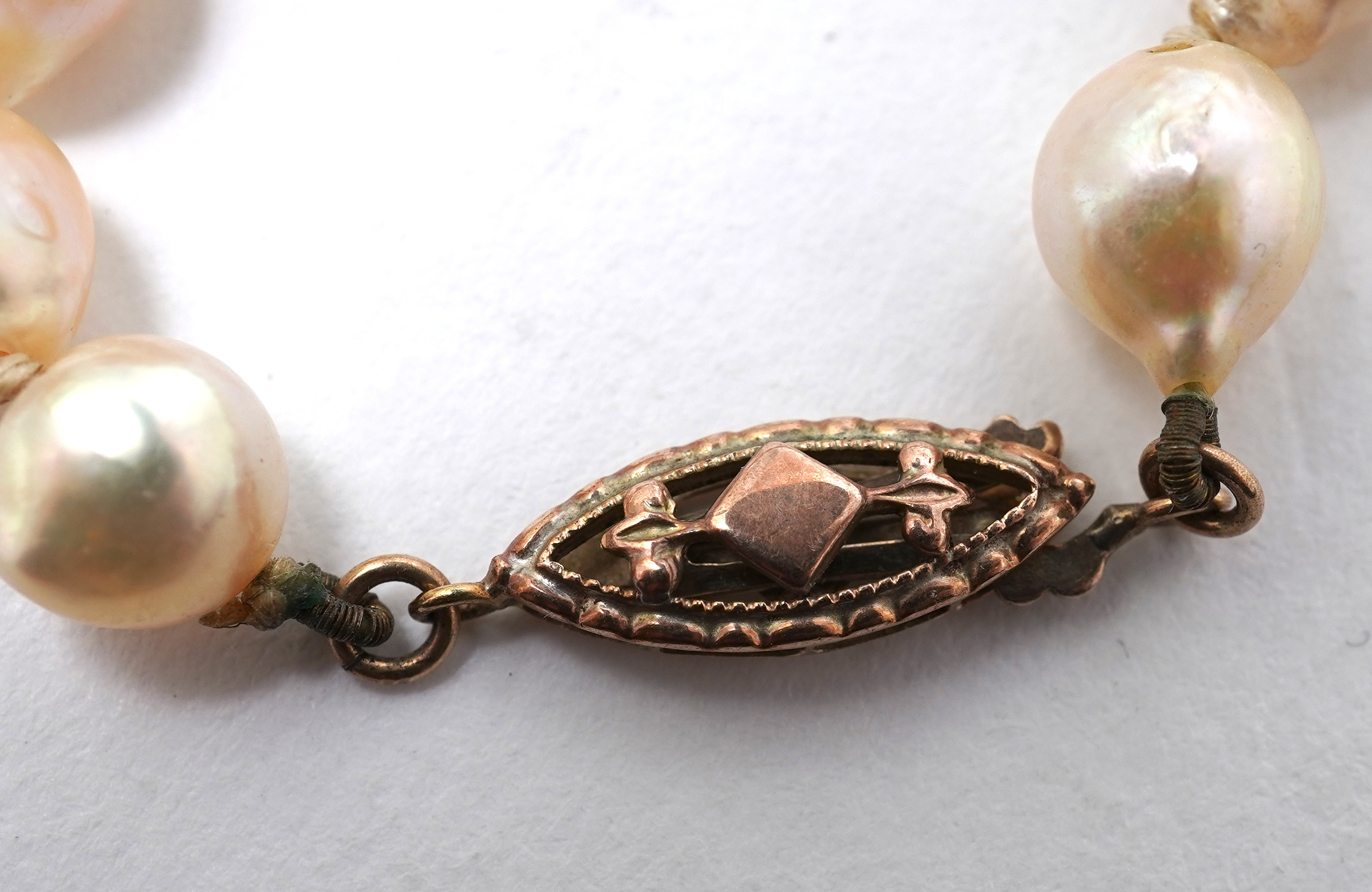 A collection of four cultured pearl necklaces